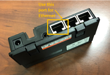 A black rectangular object with ports

Description automatically generated